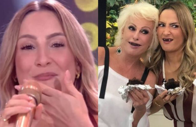 Claudia Leitte cospe durante música e sorri com bolo no dente