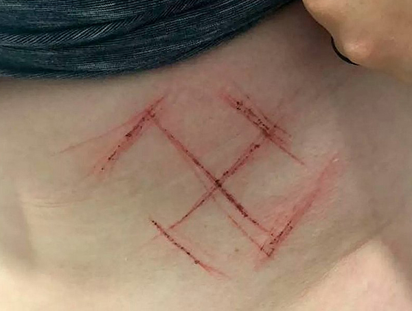 Suástica: polícia indiciará jovem por falsa comunicação de crime