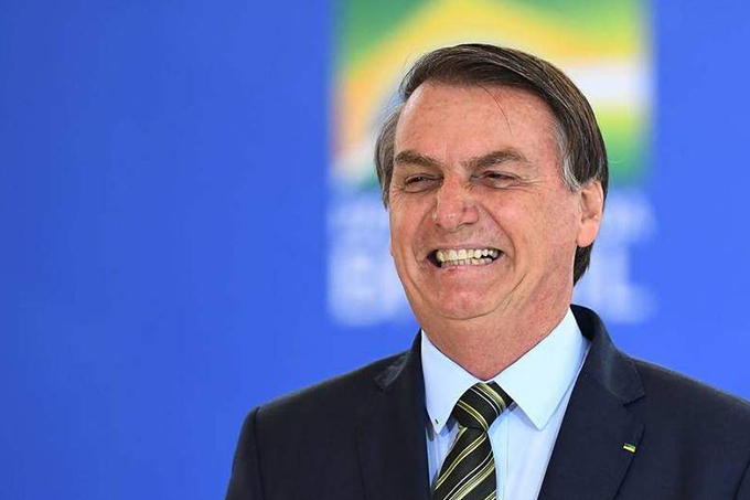 Após participar de ato, Bolsonaro fala em 'democracia e liberdade acima de tudo'