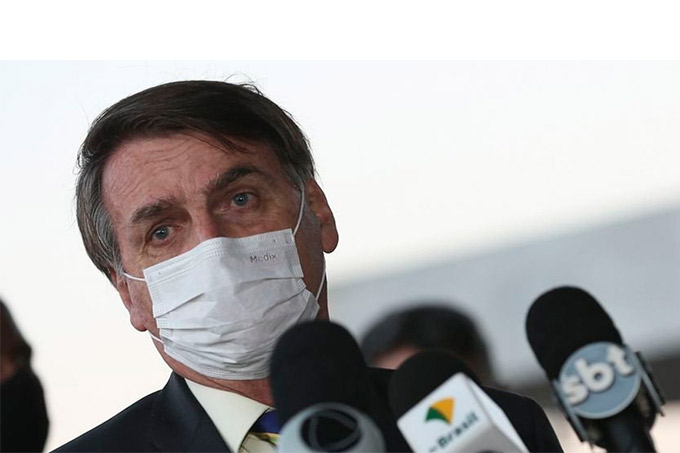'Quem não quiser trabalhar, que fique em casa', diz Bolsonaro após recorde de mortes