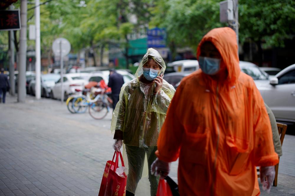 China volta a registrar casos de Covid em Wuhan, no pior surto dos últimos meses