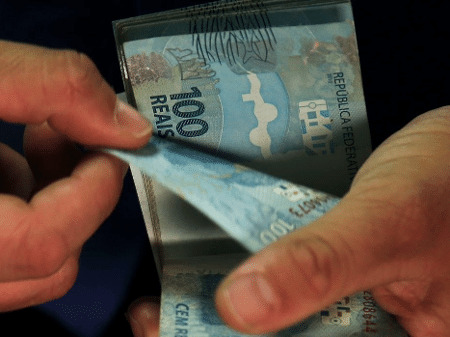 Caixa paga novo Bolsa Família a beneficiários com NIS de final 3